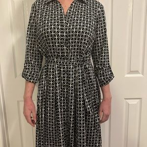 Black and white wrap tie button front dress